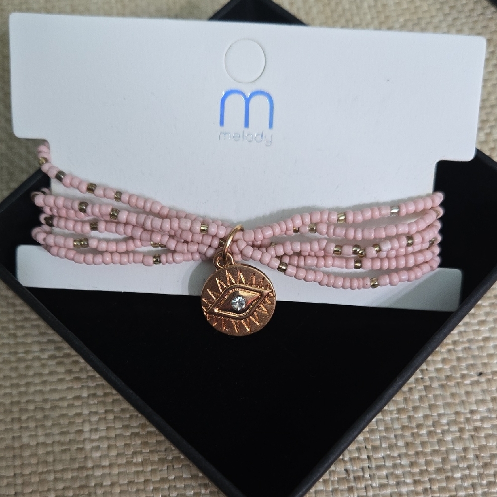 Pink Beaded Bracelet with Gold Charm